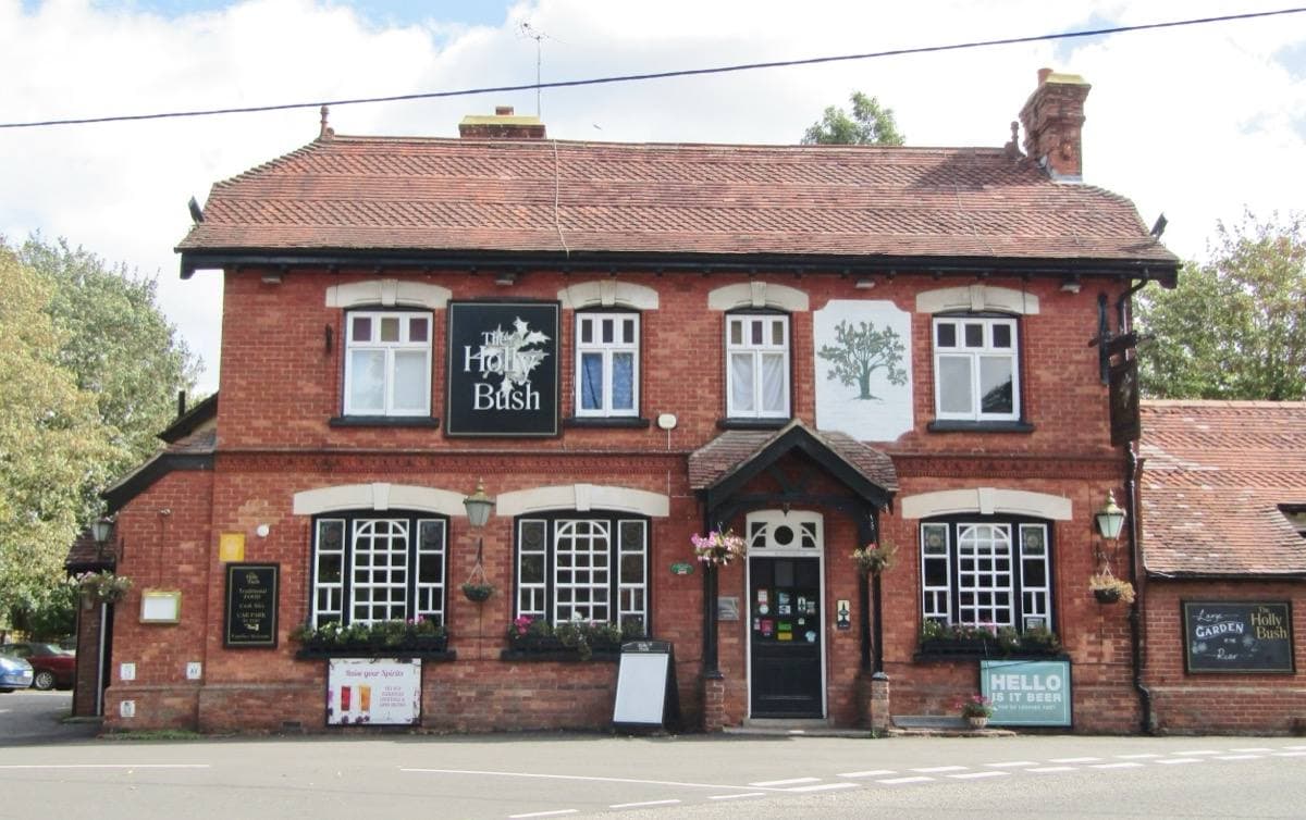 A village pub and road in Headley
