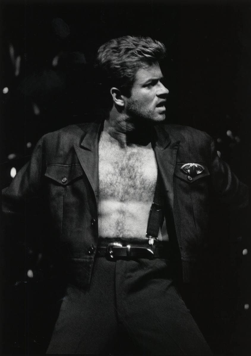 George Michael: Faith: hang his cross earring over thirteen real places and let it swing until it rests on one; drop the Faith vocal in a syllable at a time, step him out of the Freedom! ’90 picture, match four Wembley nights to who stood beside him, open the Roundhouse to 2,000 nurses and raise five Symphonica curtains.
