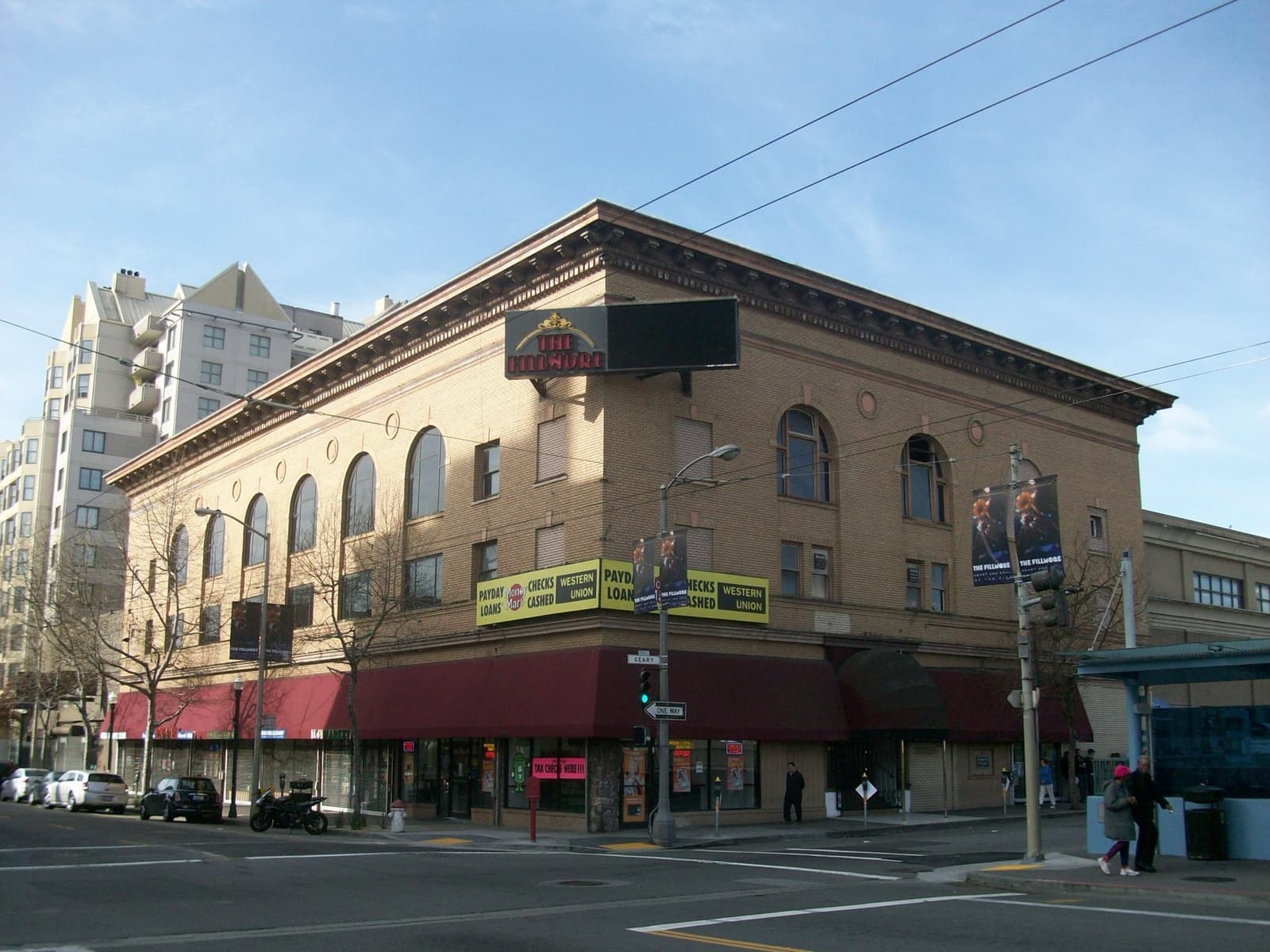 The Fillmore’s brick and terracotta corner building with a red awning