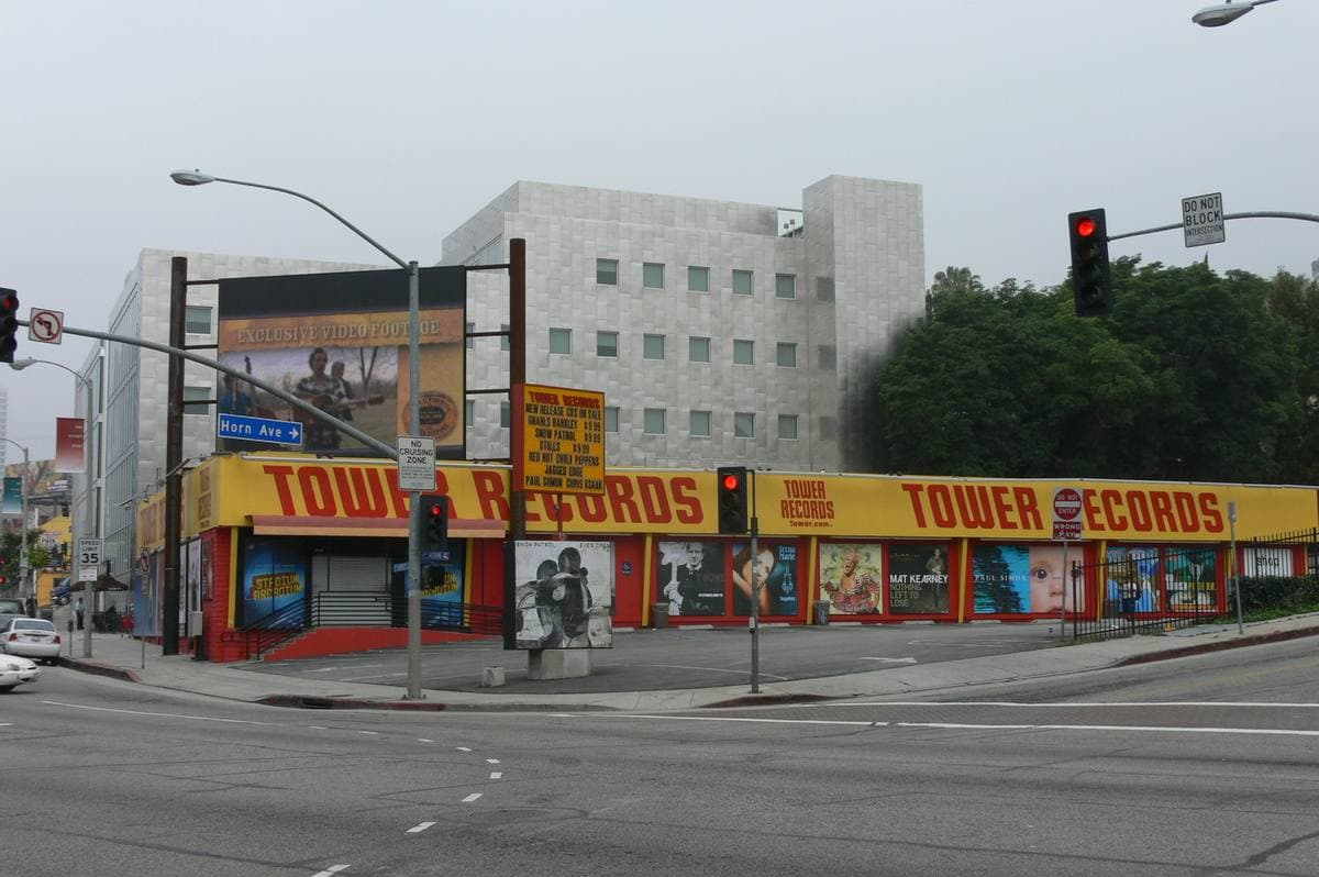 The low yellow and red Tower Records building on the corner of Sunset Boulevard