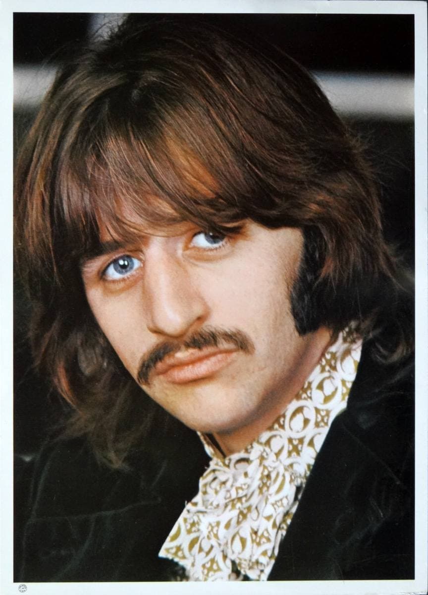 Ringo Starr with a beard and long hair