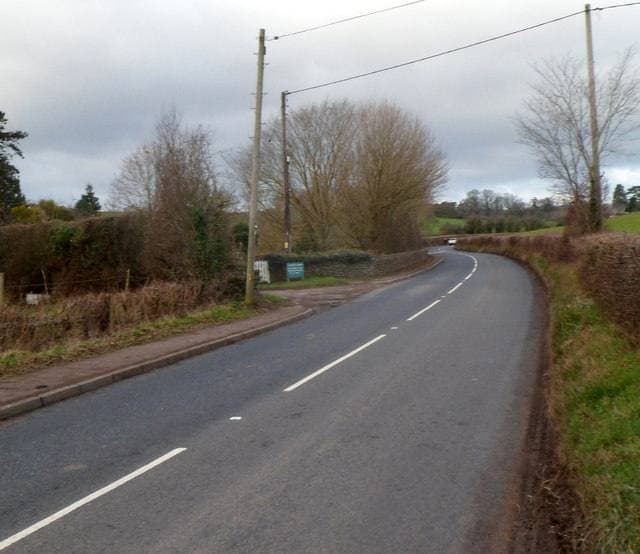 A country road passing the entrance to Rockfield Studios