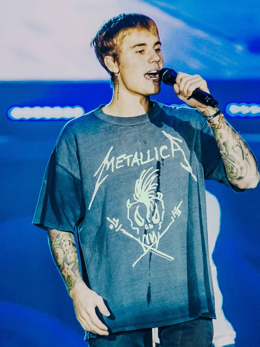 Justin Bieber singing on stage in 2016