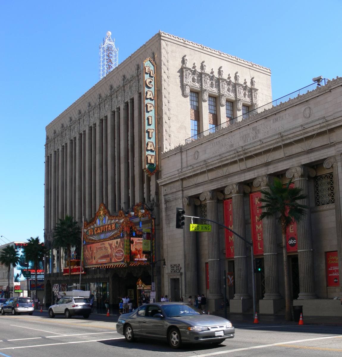 Hollywood Boulevard with the El Capitan theatre and a tall office tower