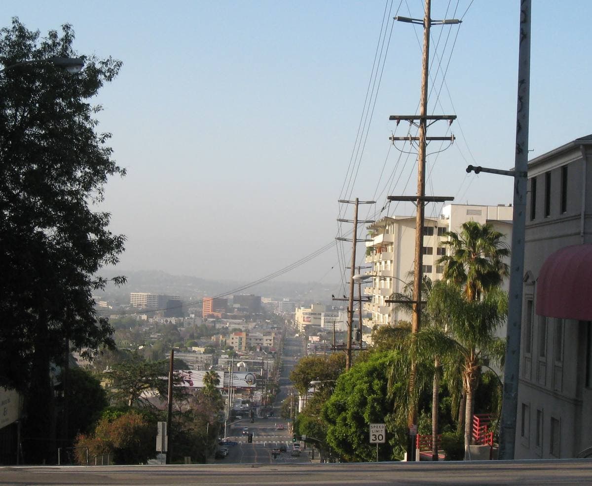 A wide boulevard junction in West Hollywood