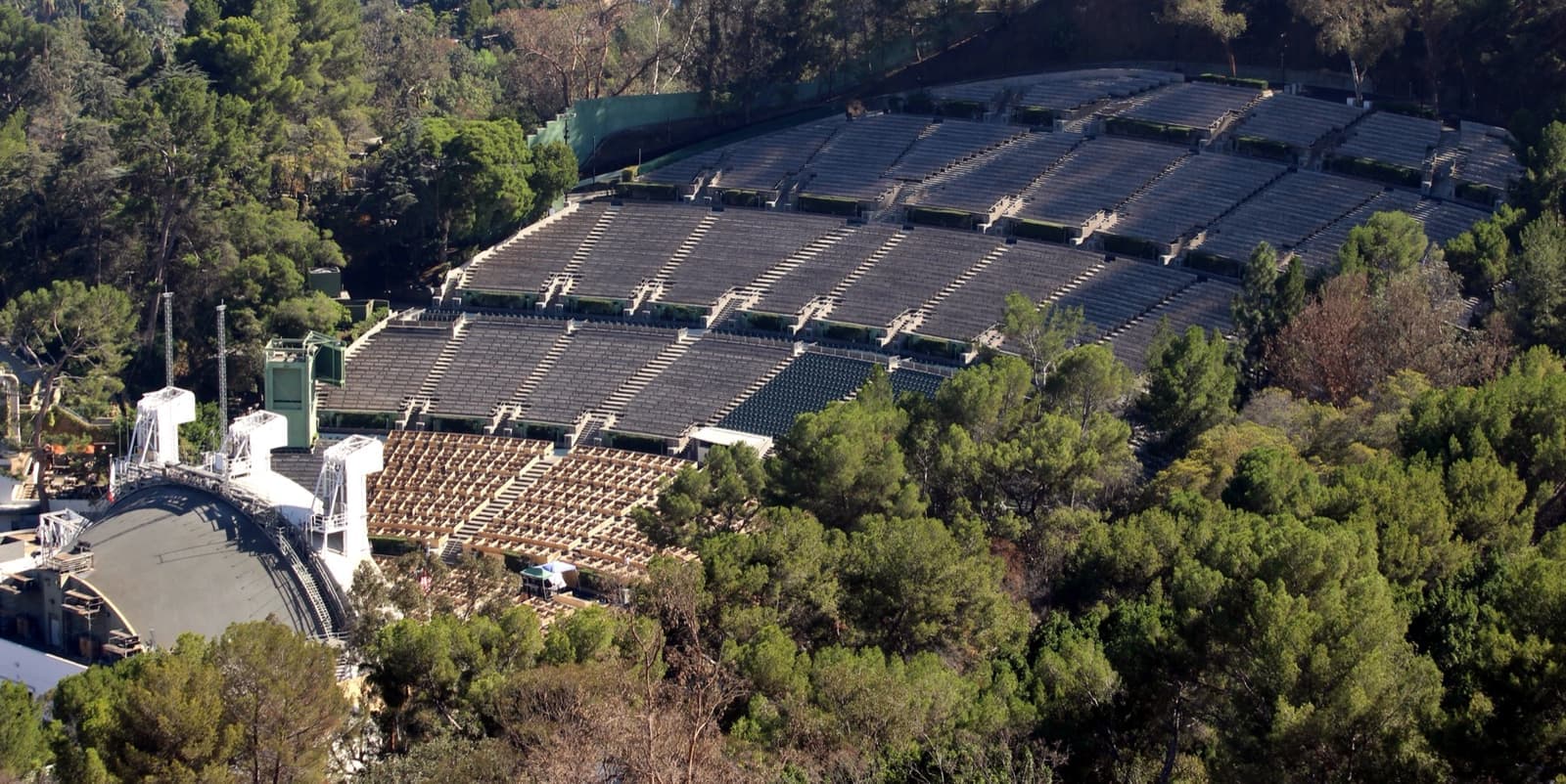 The Hollywood Bowl’s white shell and curved rows of seats set into a wooded hillside