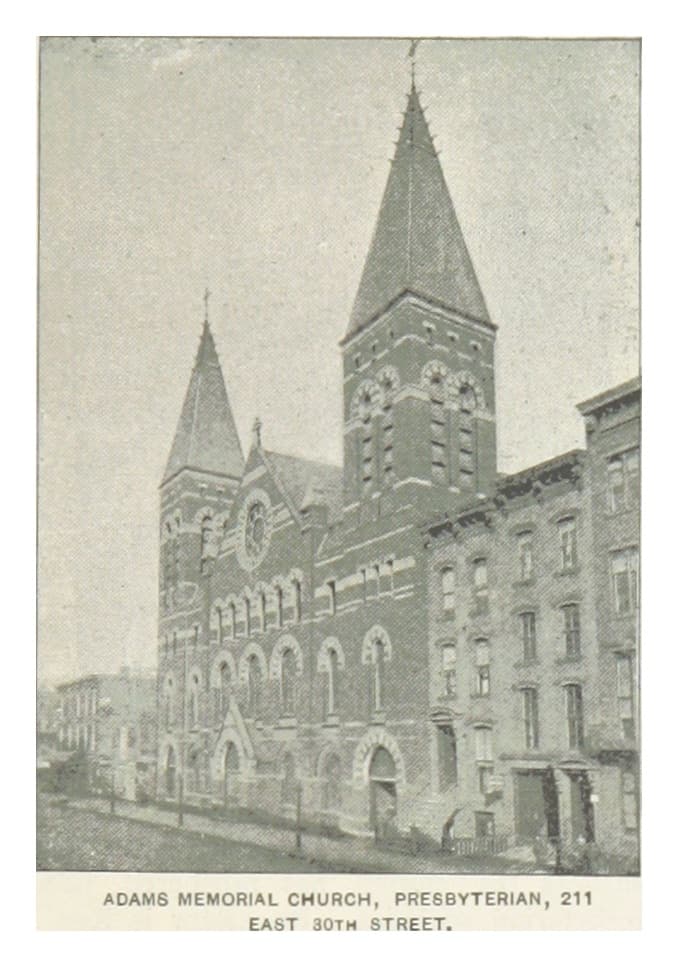 An engraving of a twin-spired brick church on a city street