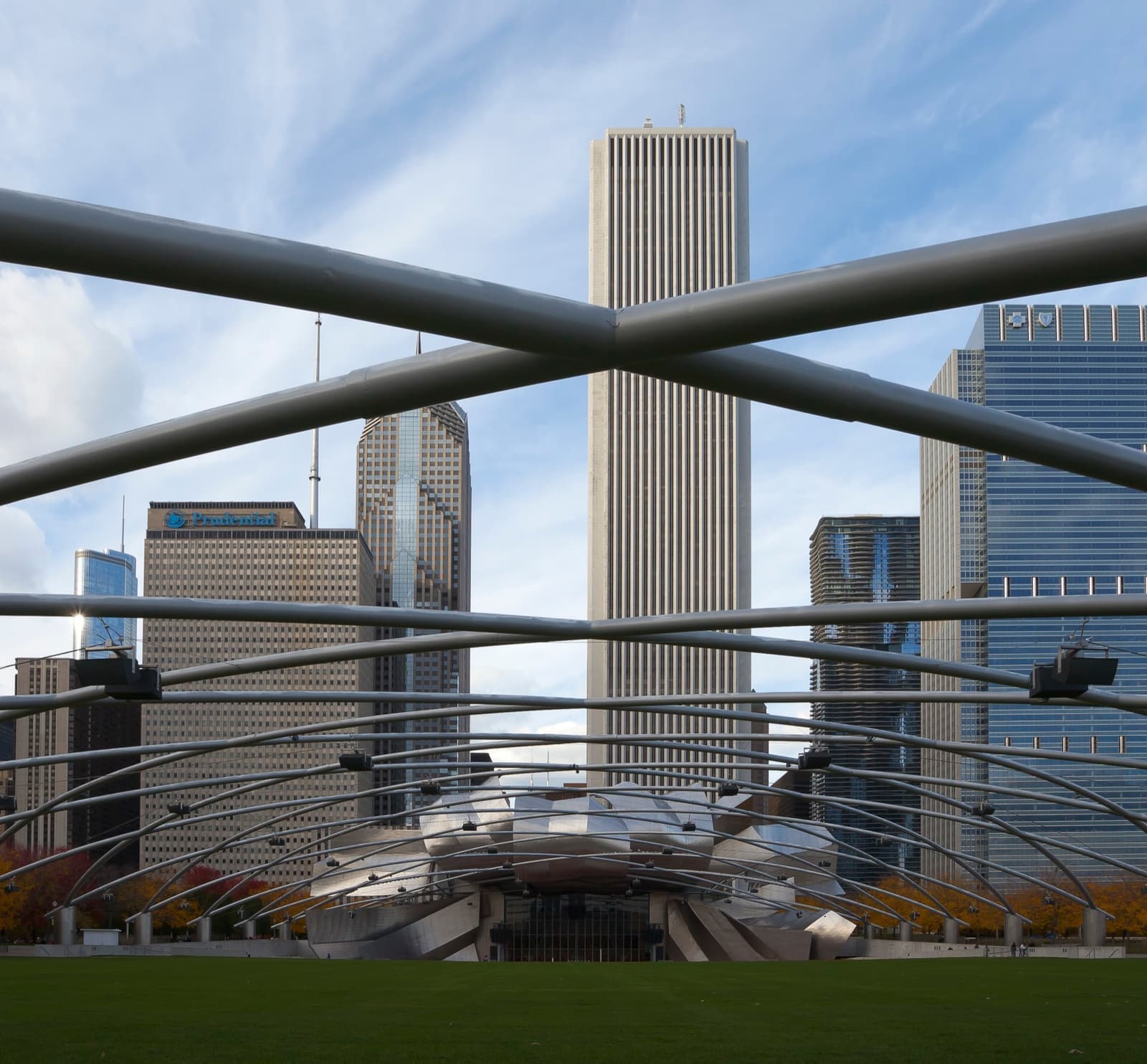 The steel ribbons of the Jay Pritzker Pavilion over its lawn
