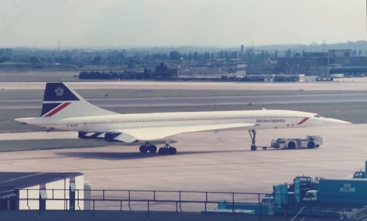A British Airways Concorde being towed across the Heathrow apron