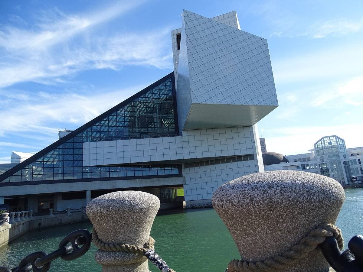 A glass pyramid and white tower on the Cleveland lakefront