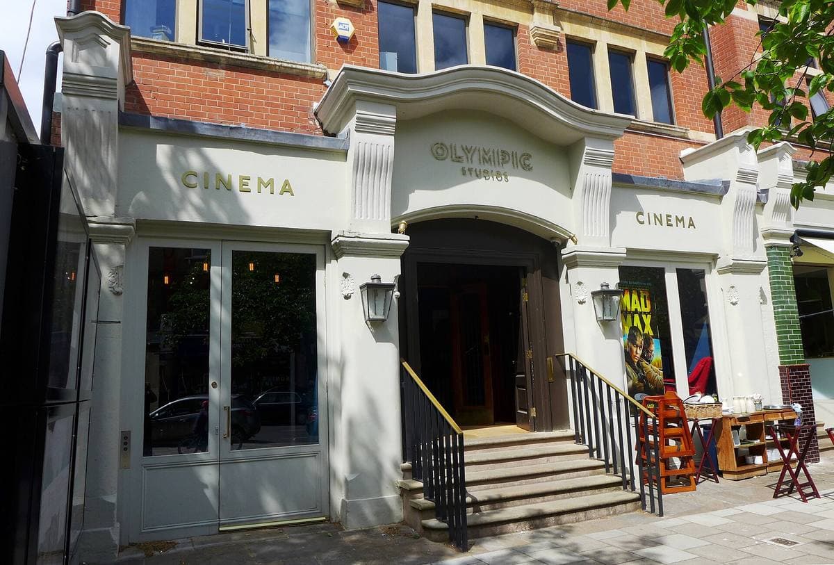 A red-brick Edwardian building with a white entrance marked Olympic and Cinema