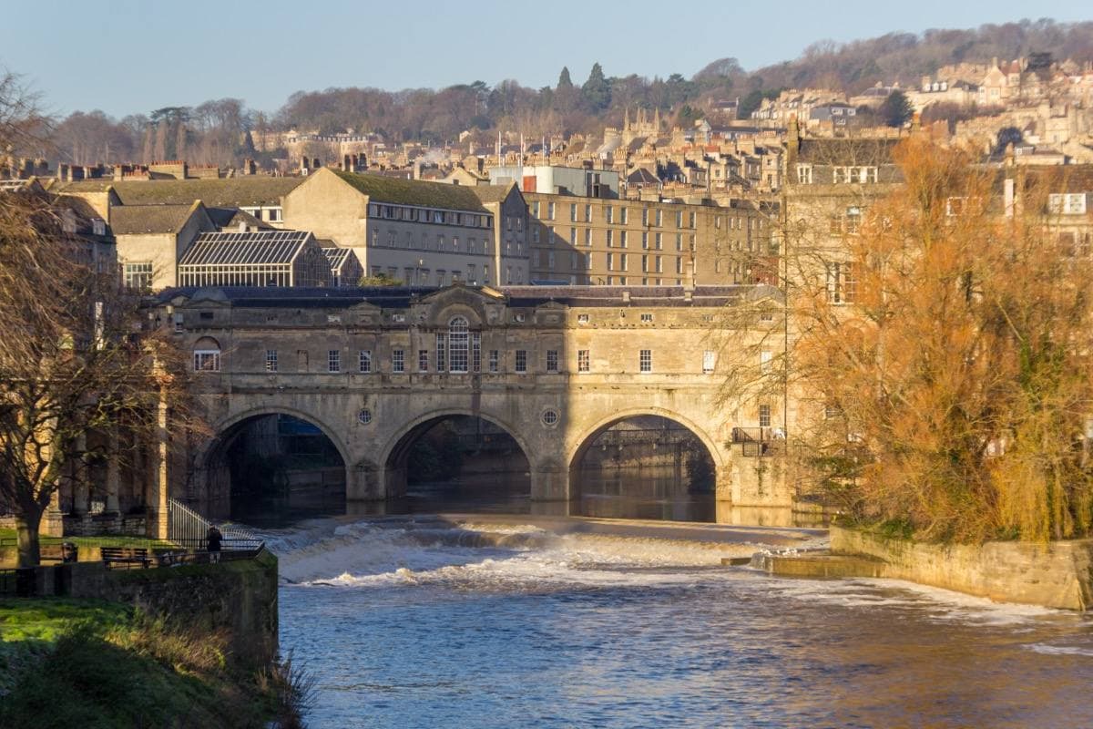 Pulteney Bridge and the curved weir on the River Avon in Bath