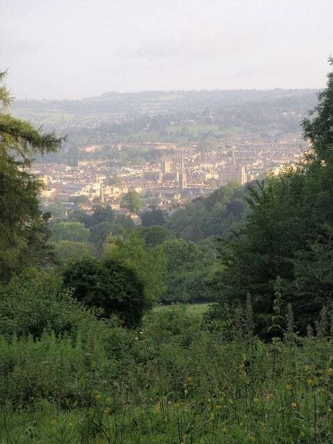 Morning light on the stone city of Bath seen from the slopes of Claverton Down