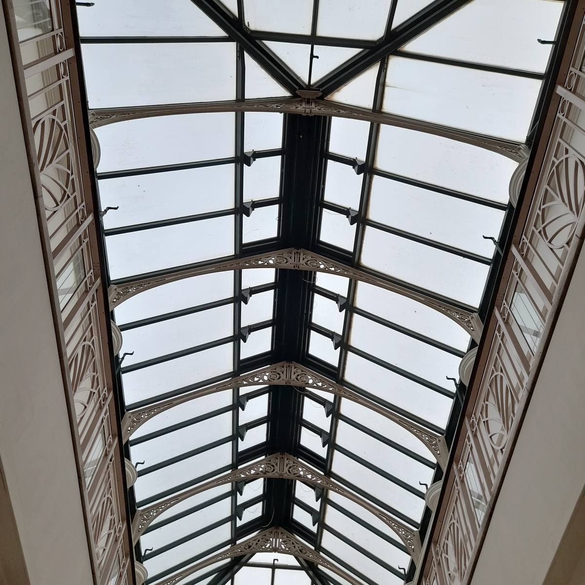 A glass and cast-iron arcade roof