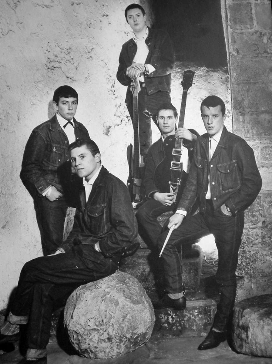 The five Animals in denim posing against the stone of Newcastle’s Castle Keep in 1964