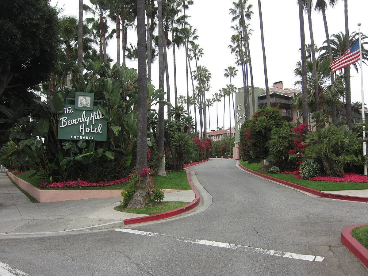 The pink Beverly Hills Hotel among palm trees