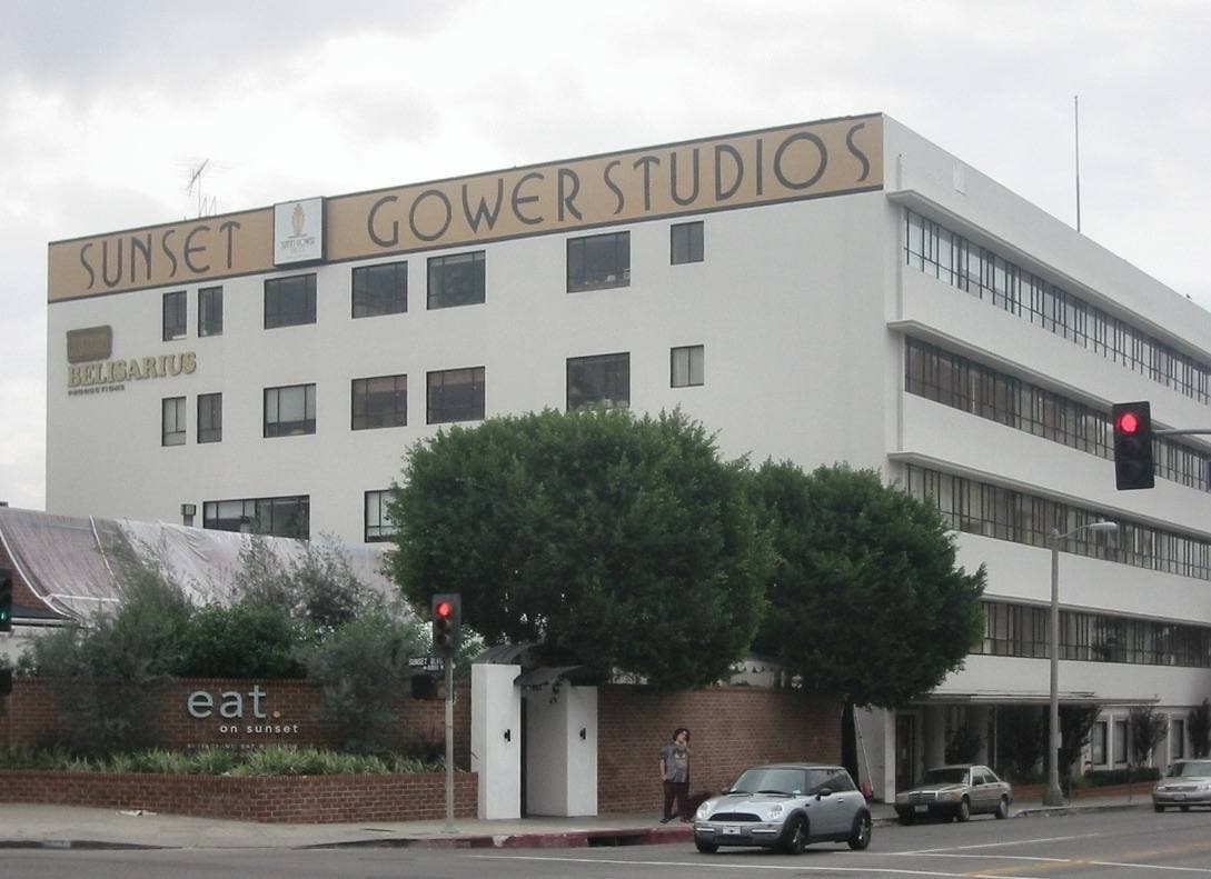 A white studio office block with Sunset Gower Studios lettered along the roof