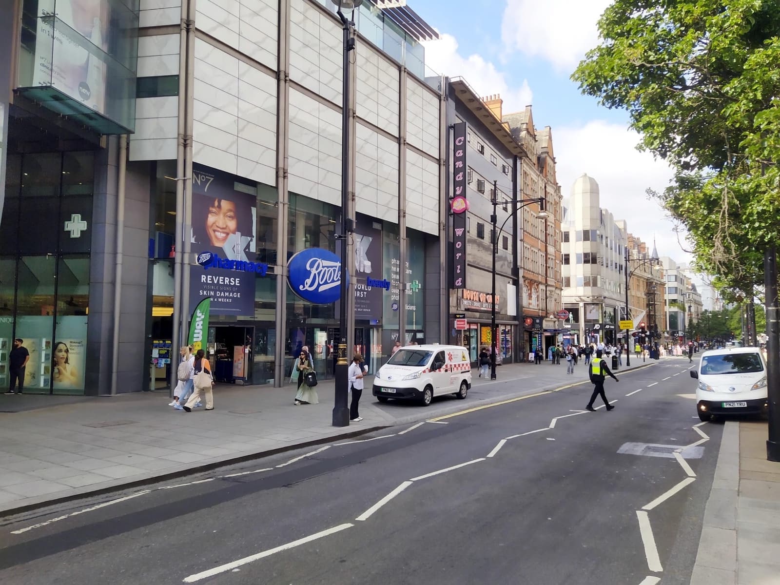 Oxford Street with shopfronts and a white van