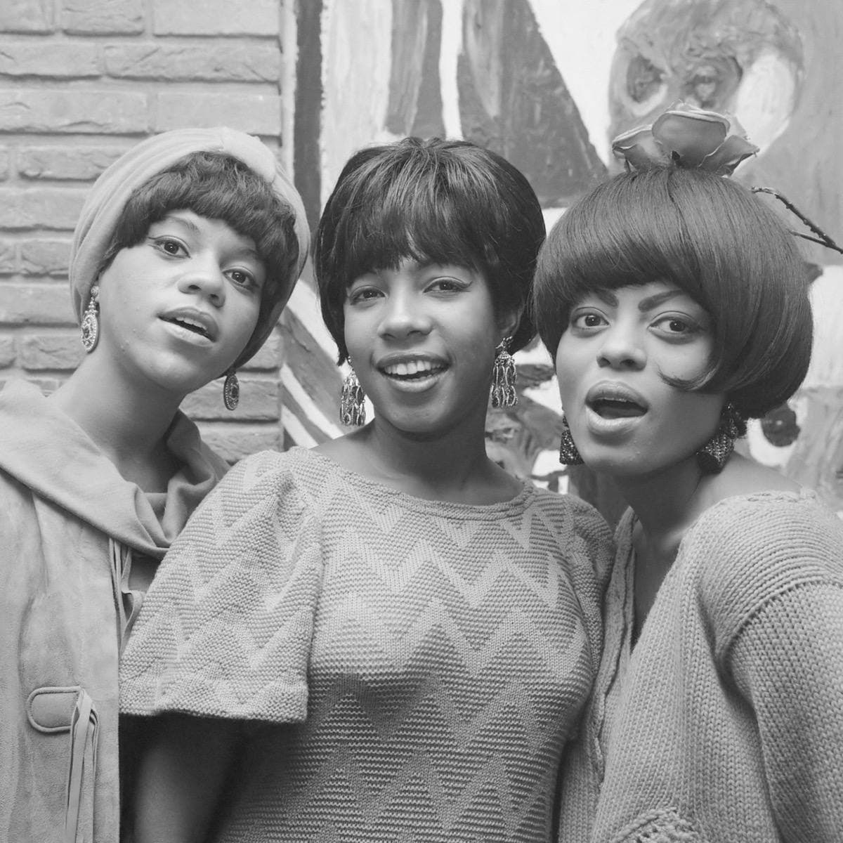 Florence Ballard, Mary Wilson and Diana Ross smiling together in 1965