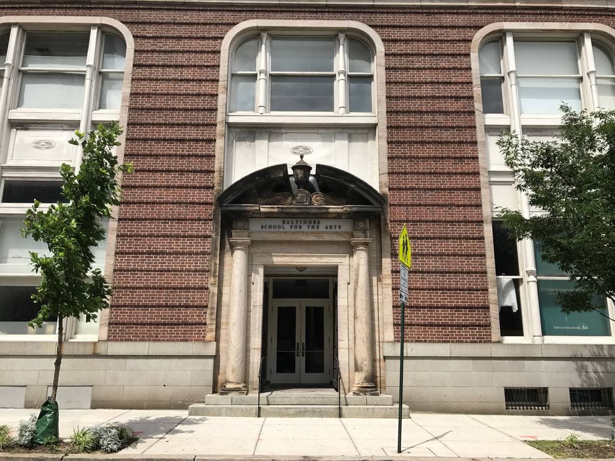 The ornate stone front of the Baltimore School for the Arts on Cathedral Street