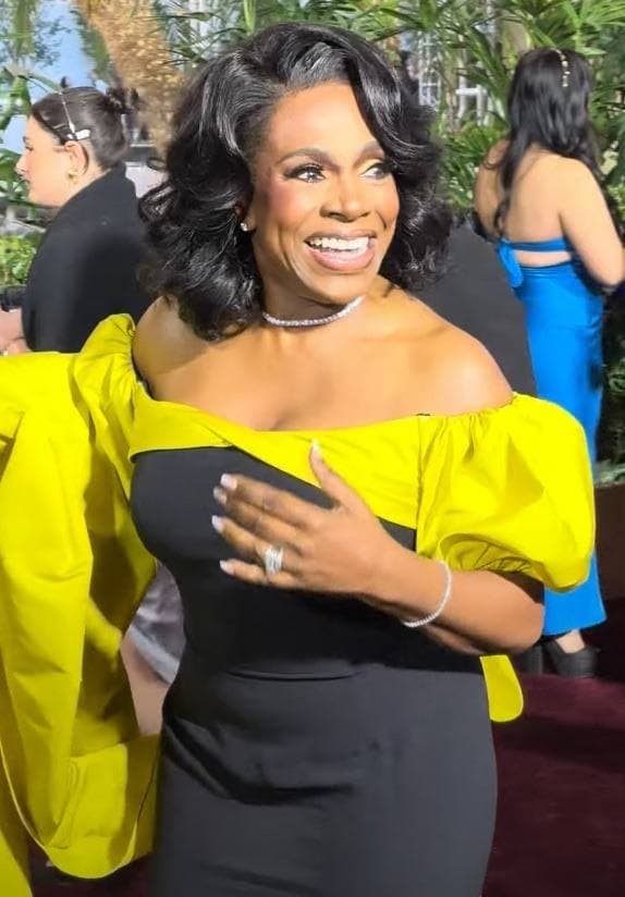 Sheryl Lee Ralph in an evening gown on a red carpet