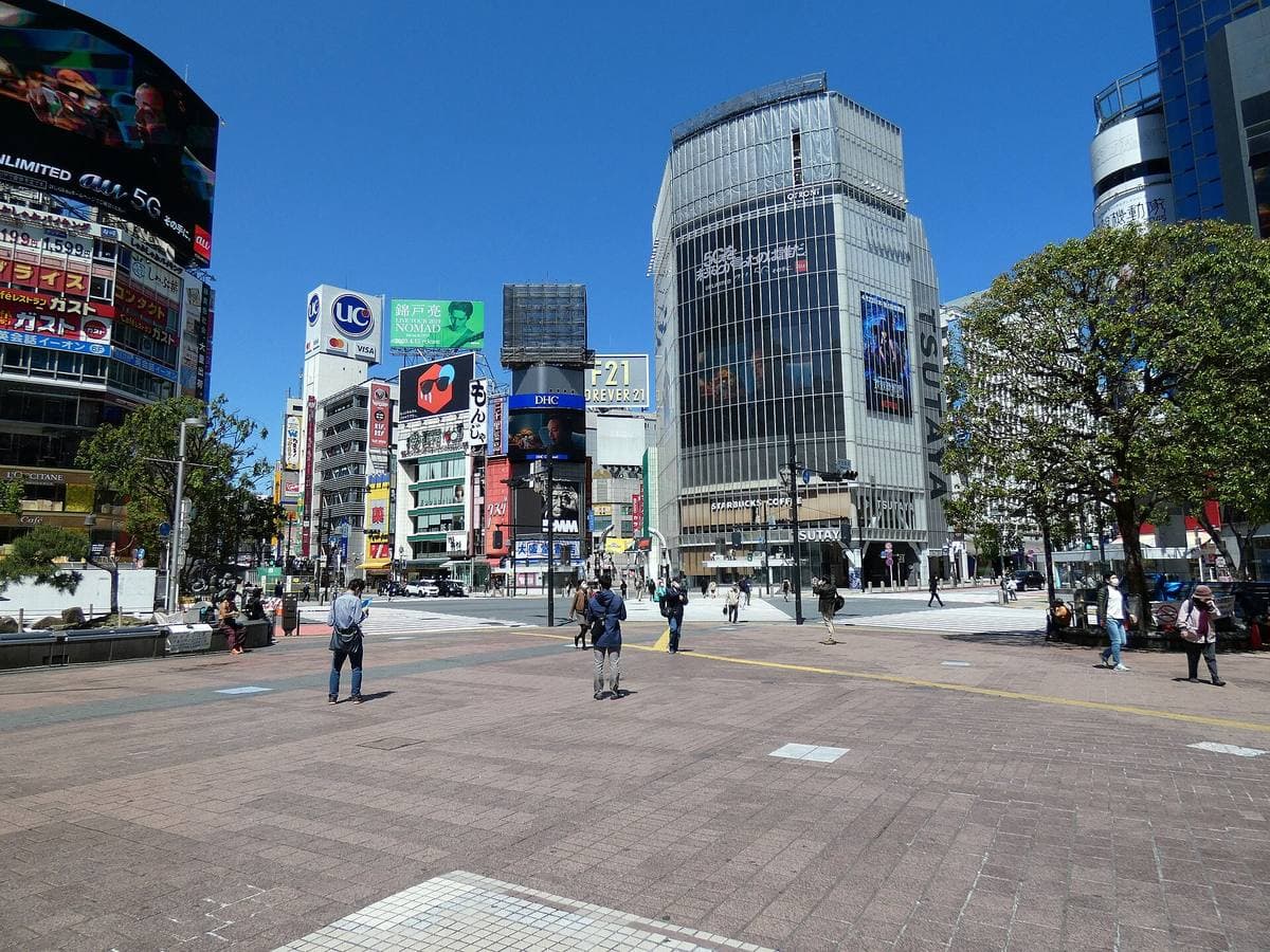 Alice in Borderland: Scramble: the real Shibuya crossing empty at 2am with a road-painted title and the last two people on its stripes, then five crosswalks that lead out of Tokyo to where the empty city was really filmed, and a built-or-drawn game for visa days.