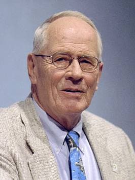Stephen Ambrose speaking at a microphone