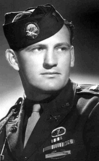 Lynn Compton standing in uniform