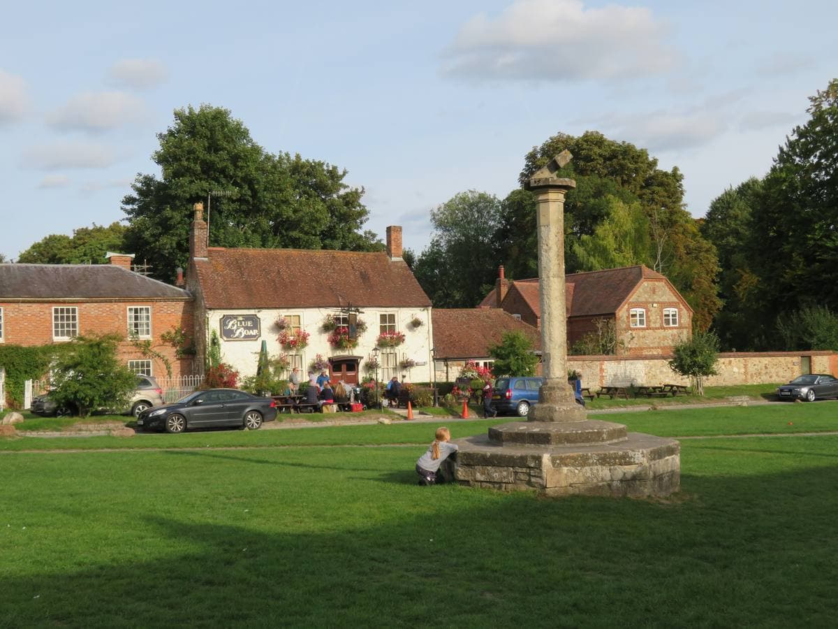 A sloping village green lined with houses