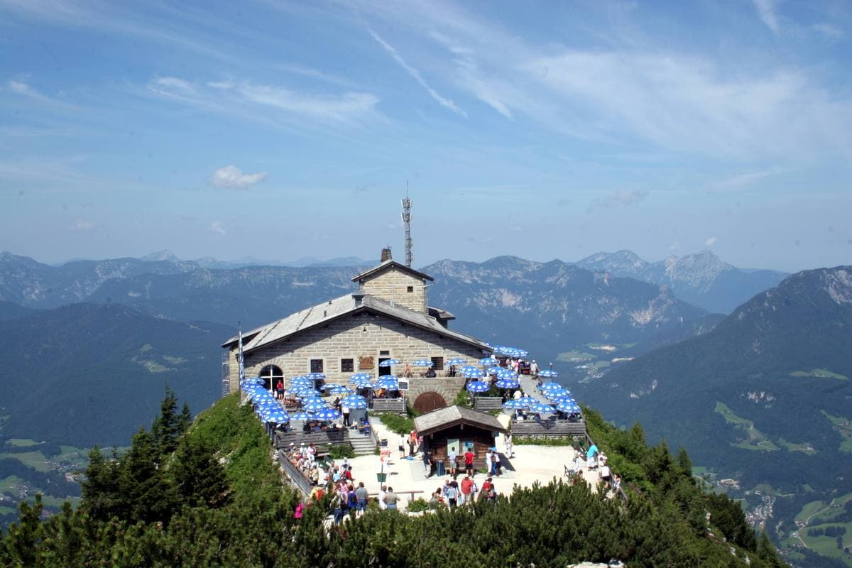 A stone house on a rocky mountain top