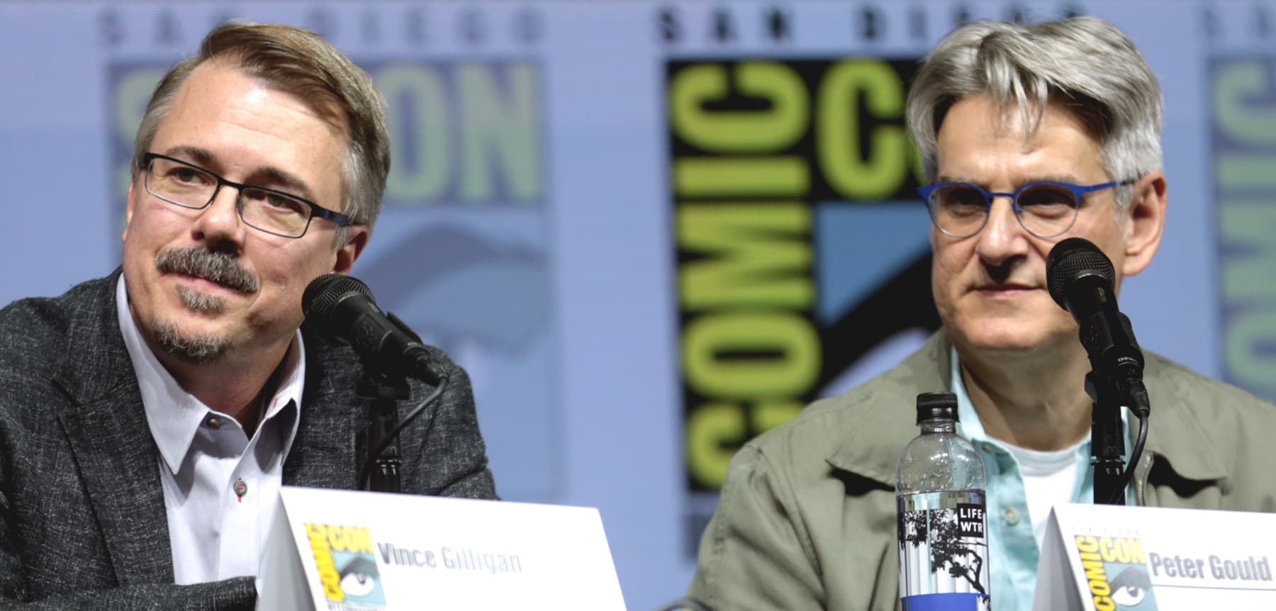 Vince Gilligan and Peter Gould at a panel table with microphones