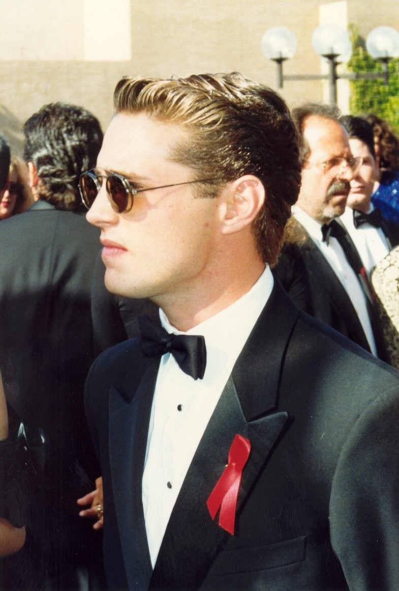 Jason Priestley in a dark suit at the 1992 Emmy Awards