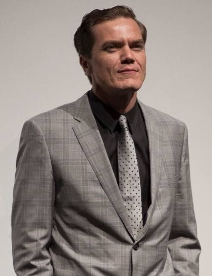 Michael Shannon in a grey check suit