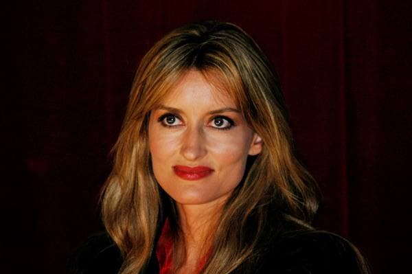 Natascha McElhone speaking on a stage at a screening