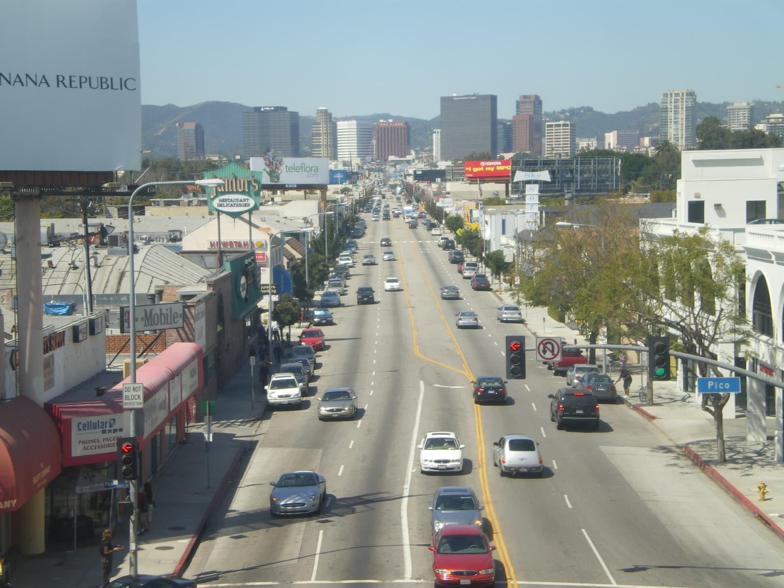 Westwood Boulevard seen from above, running north between low shops and trees