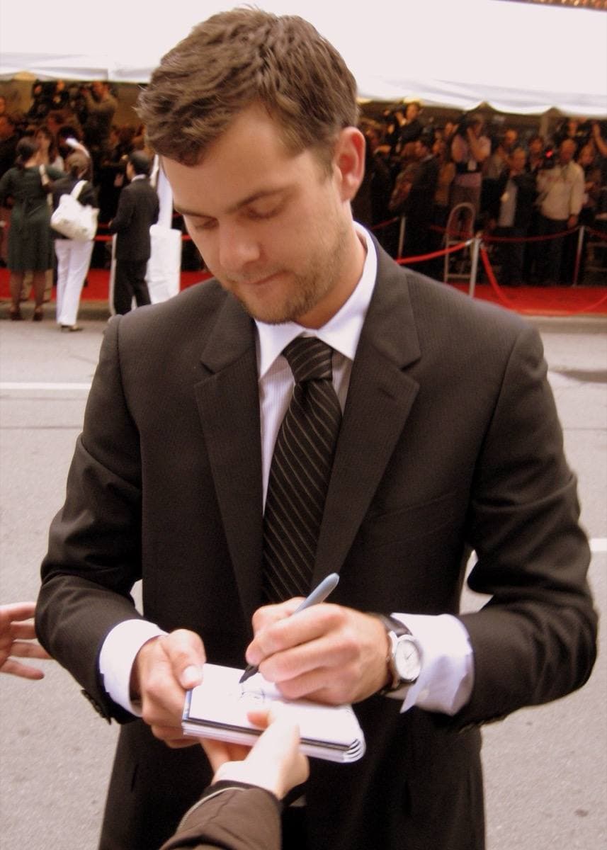 Joshua Jackson in a dark jacket at a film premiere