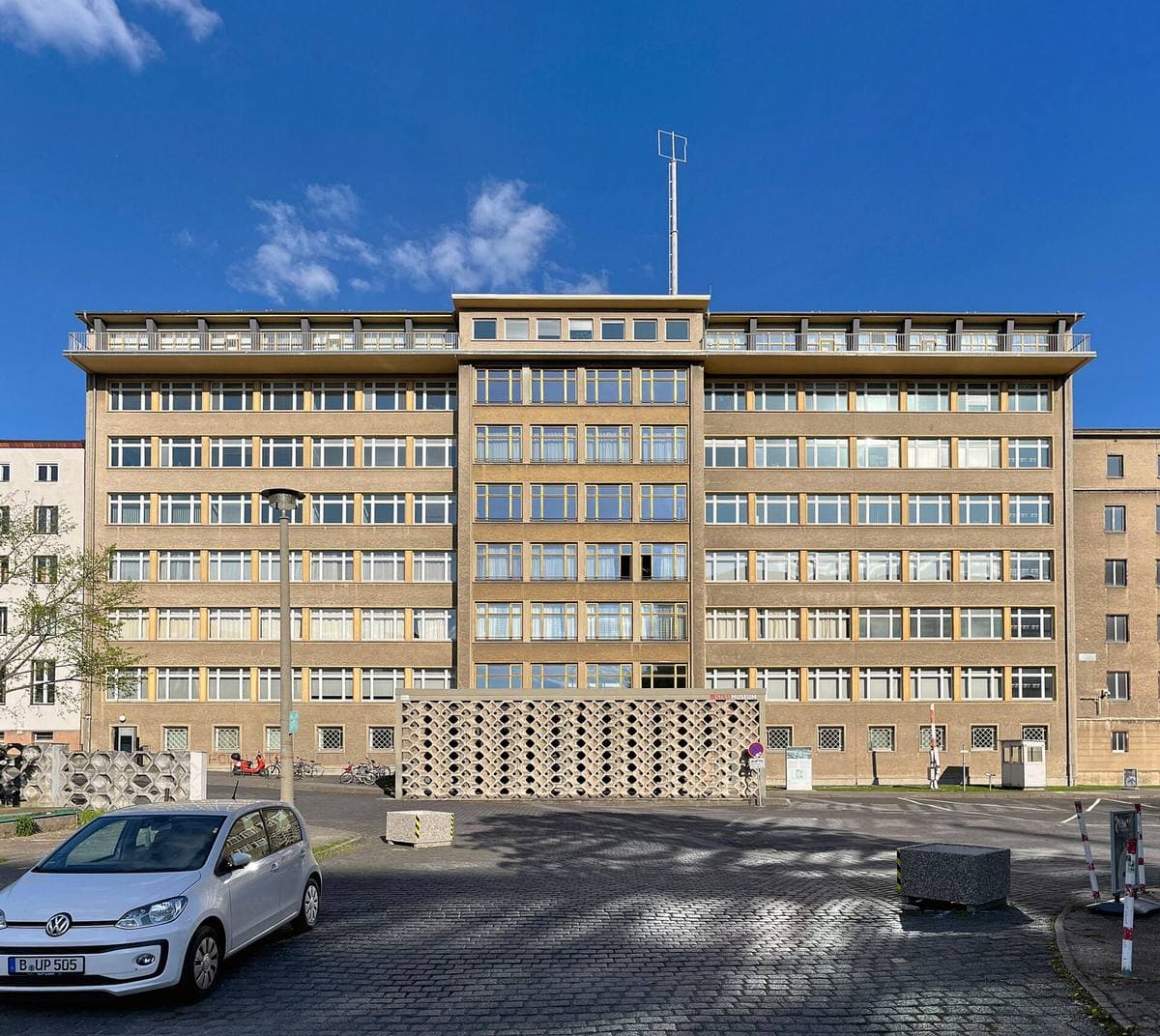 The long pale façade of the former Stasi ministry building