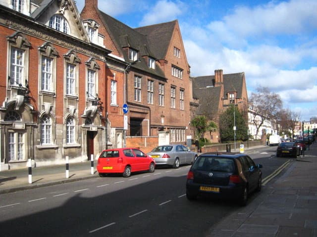 A residential street of brick buildings in Shepherd’s Bush
