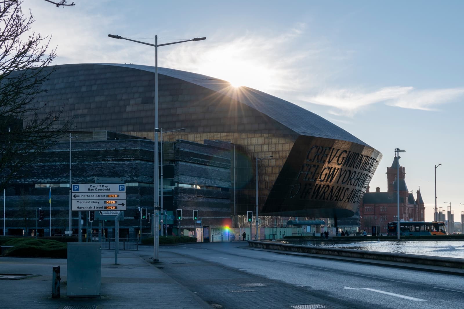 The bronze-domed Wales Millennium Centre seen from Lloyd George Avenue
