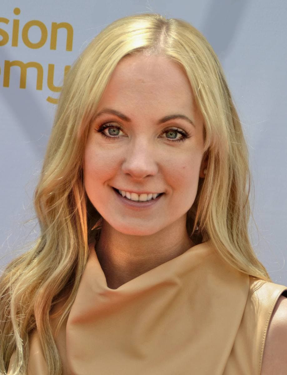 Joanne Froggatt smiling, long fair hair