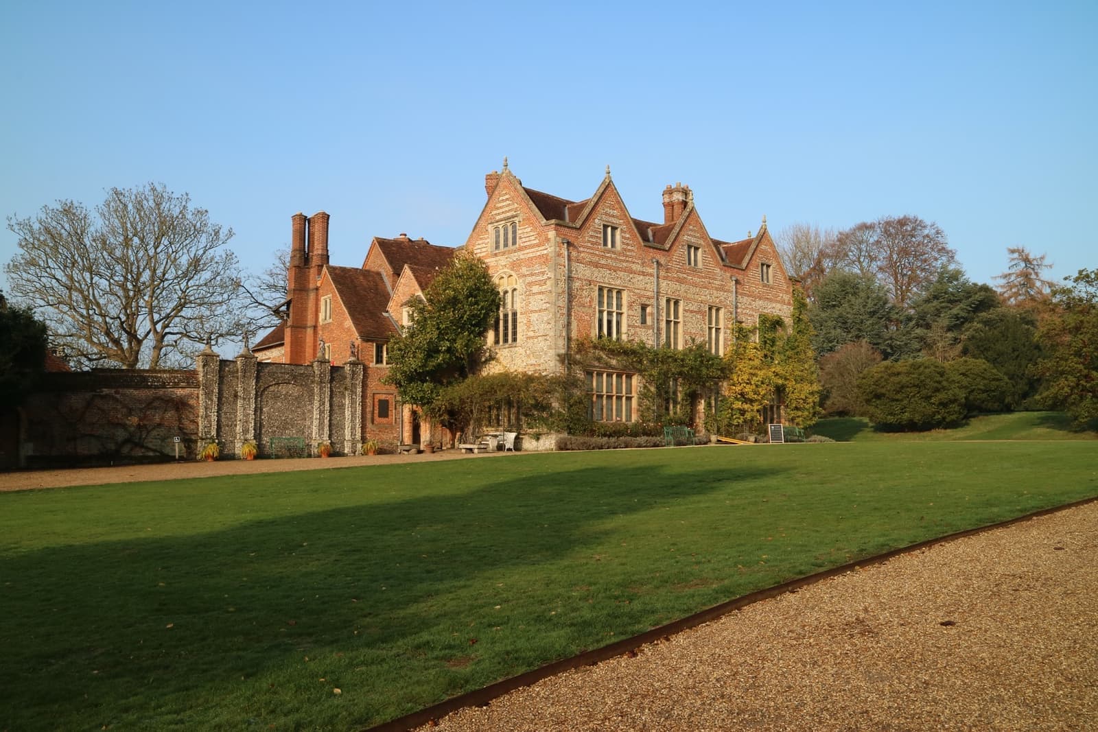 A gabled Tudor house of brick and flint
