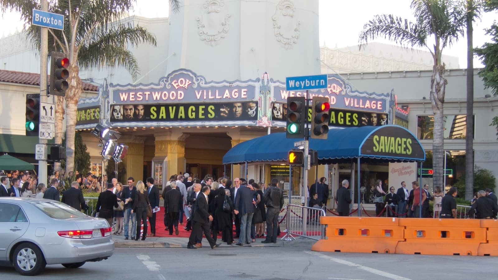 Crowds and a red carpet under a theatre marquee on Broxton Avenue