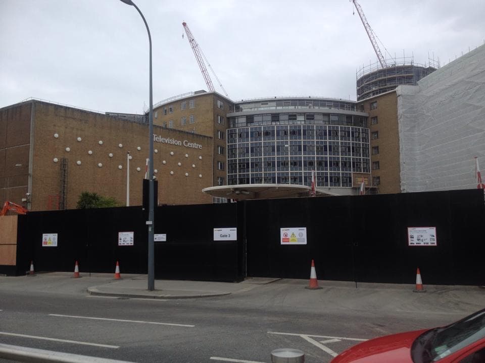 The curved front of Television Centre in White City during building work