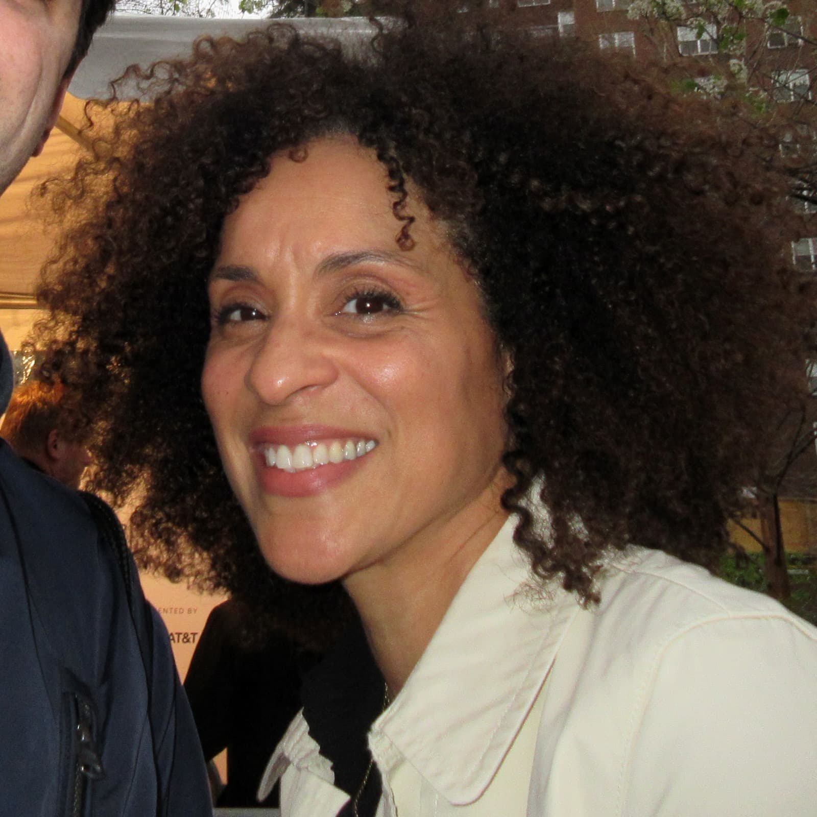 Karyn Parsons smiling, head and shoulders