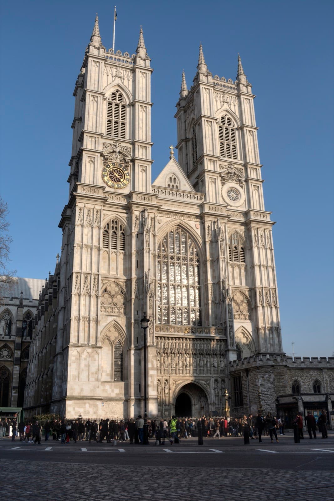 The twin Gothic towers of the abbey’s west front in evening light