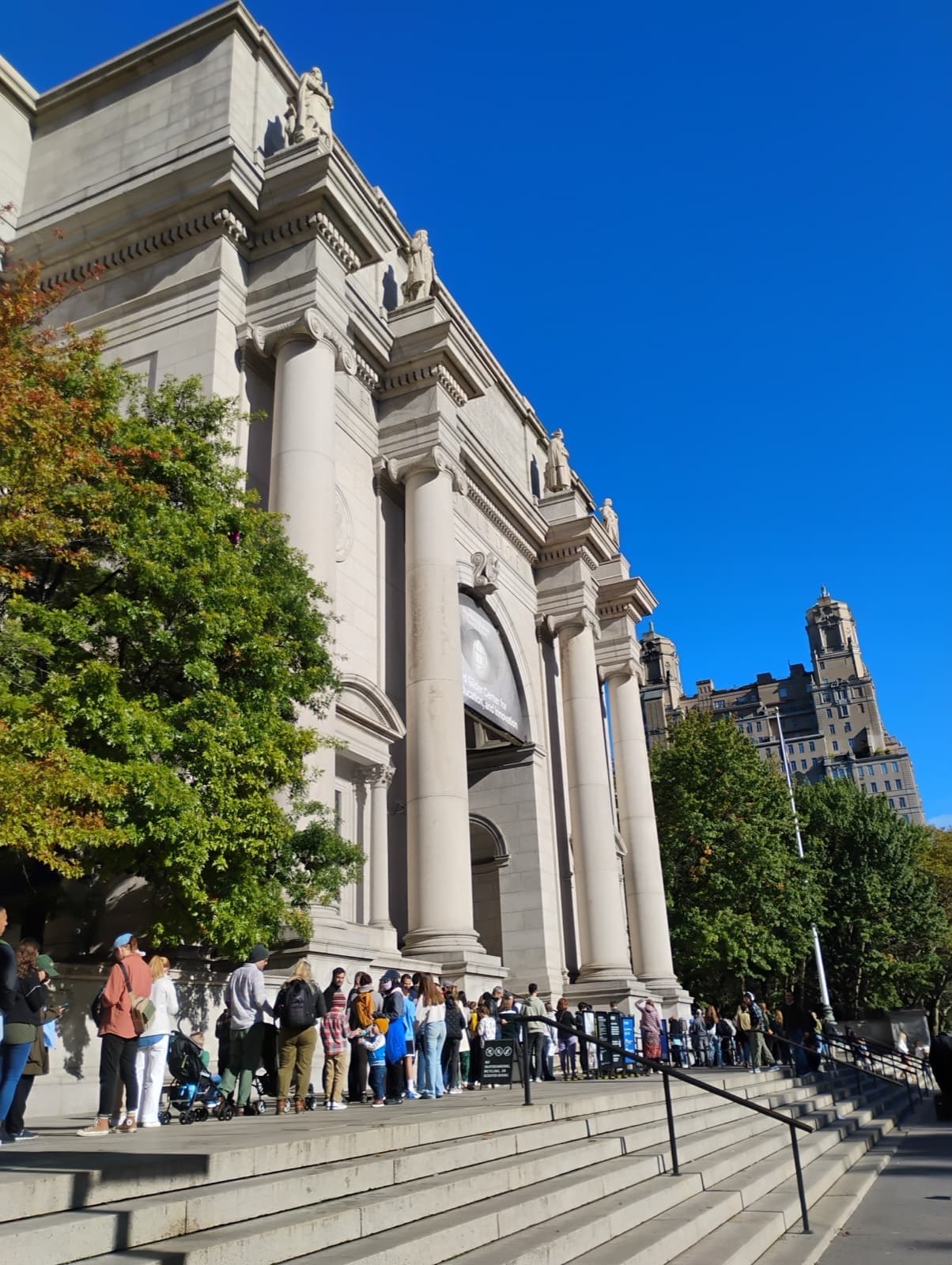 The columned Central Park West entrance of the museum with an equestrian statue removed and steps empty
