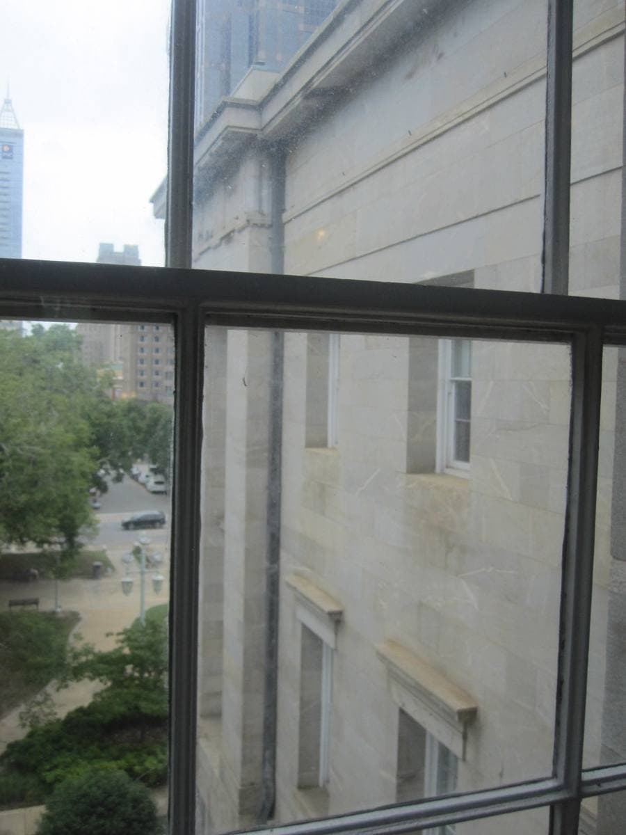 A granite Greek Revival capitol with a copper dome