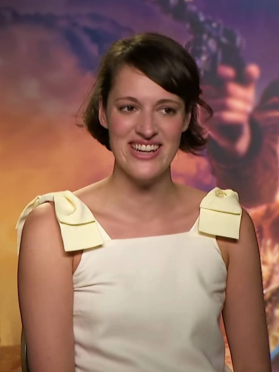 Phoebe Waller-Bridge, dark hair swept back, mid-sentence