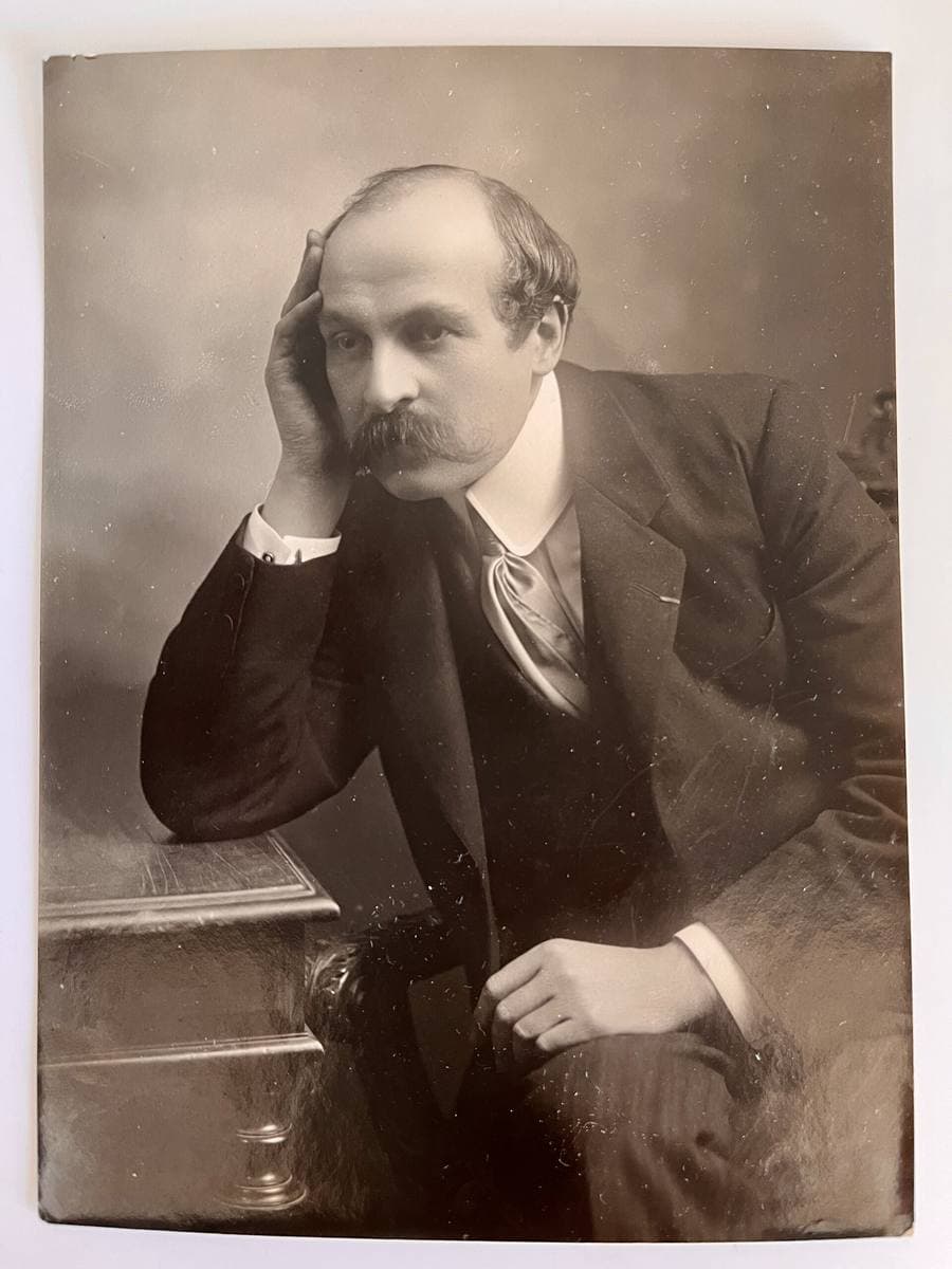 Maurice Leblanc in a dark suit and moustache, in a studio portrait