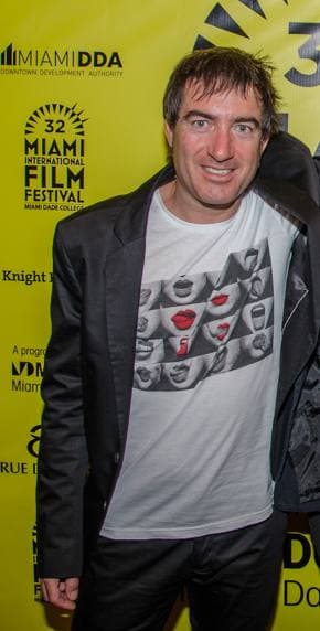 Álex Pina in a dark jacket